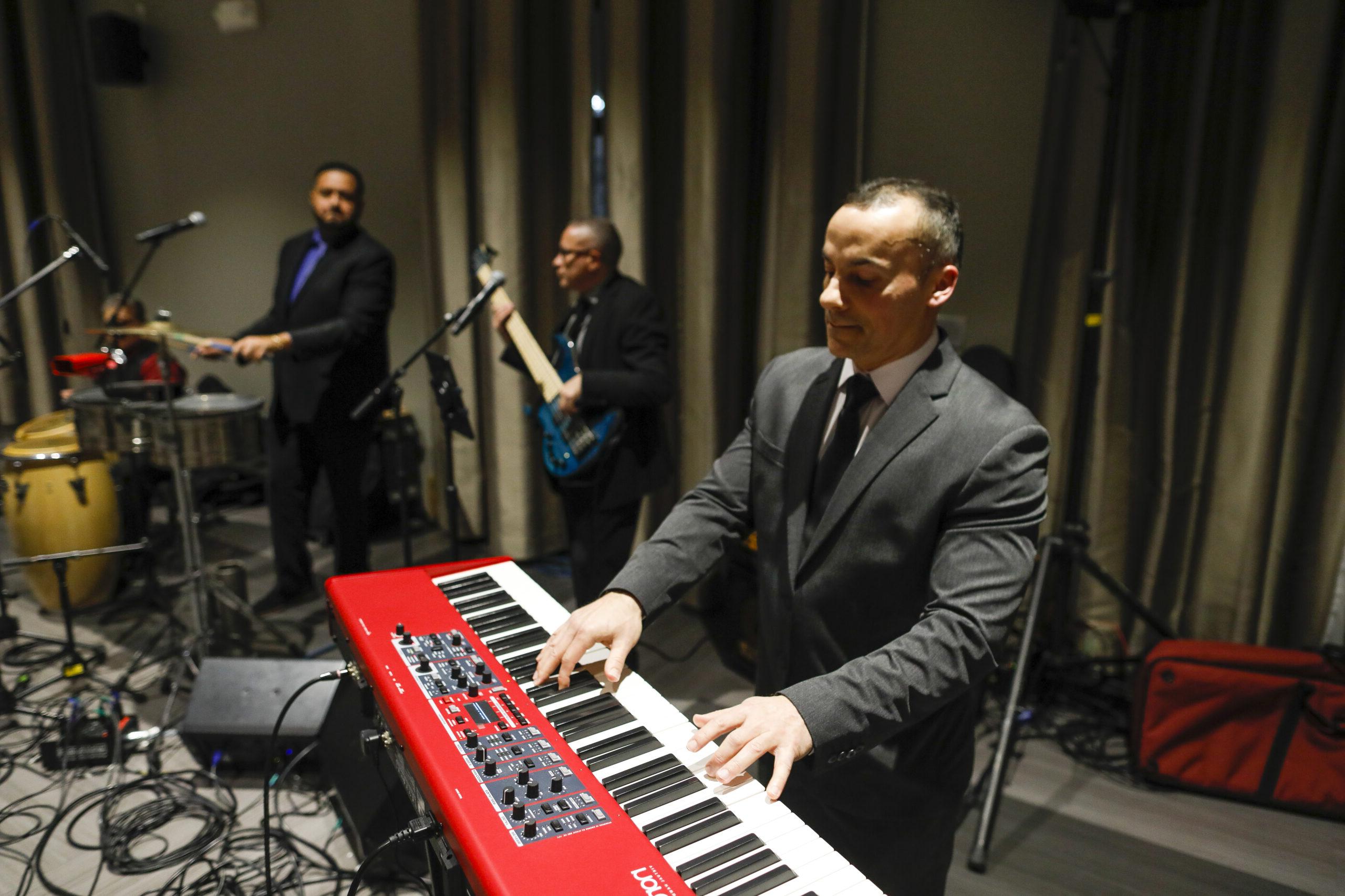 Freddie Colon and his band perform at the 2024 Presidential Stronger As One Diversity Awards reception in Feldman Ballroom January 25, 2024. // photo by Matt Wittmeyer for the University of Rochester